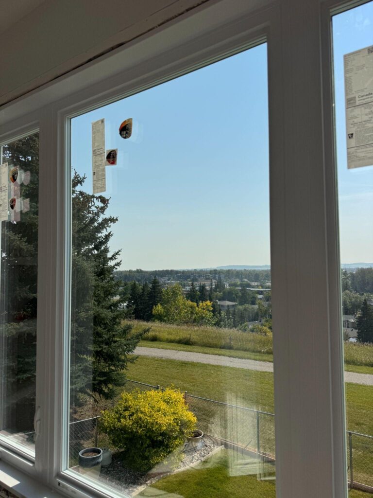 Energy-efficient Weather Pro vinyl replacement window in an Edmonton home, delivering clear views, thermal performance, and lasting durability.