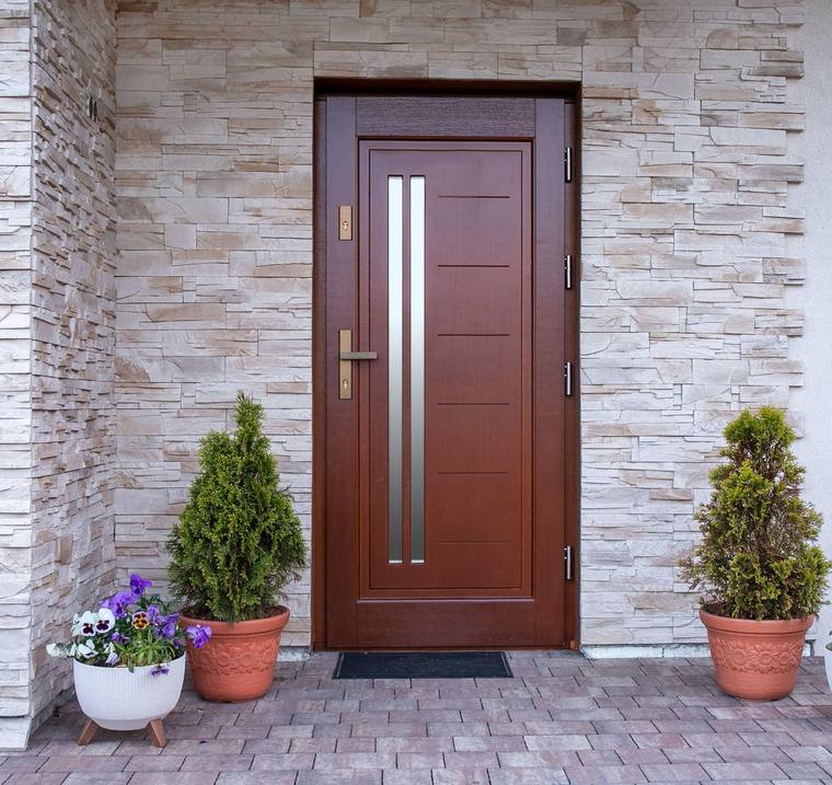 Entry and Exterior Door for Alberta Winters Brown insulated entry door designed for Alberta winters