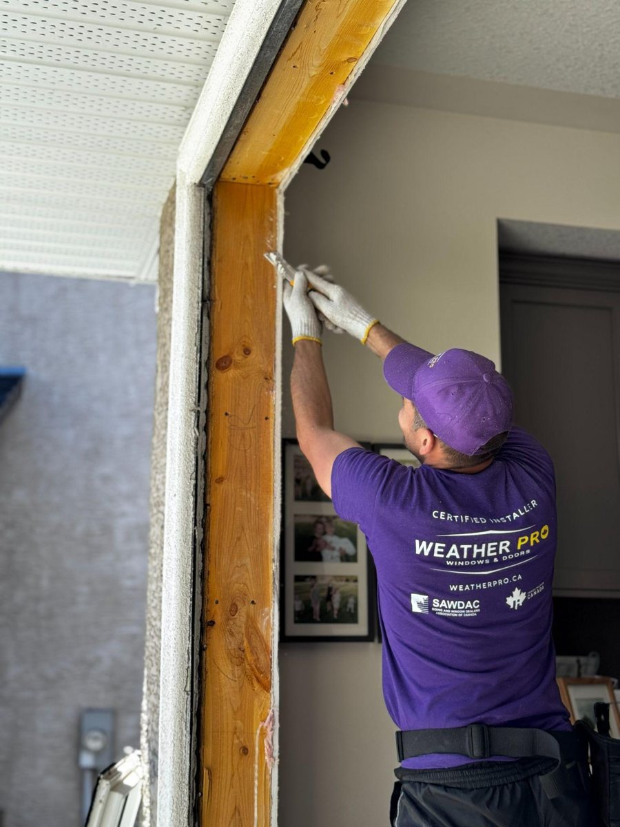 Retrofit windows versus full frame replacement Weather Pro installer preparing a window opening for full frame replacement
